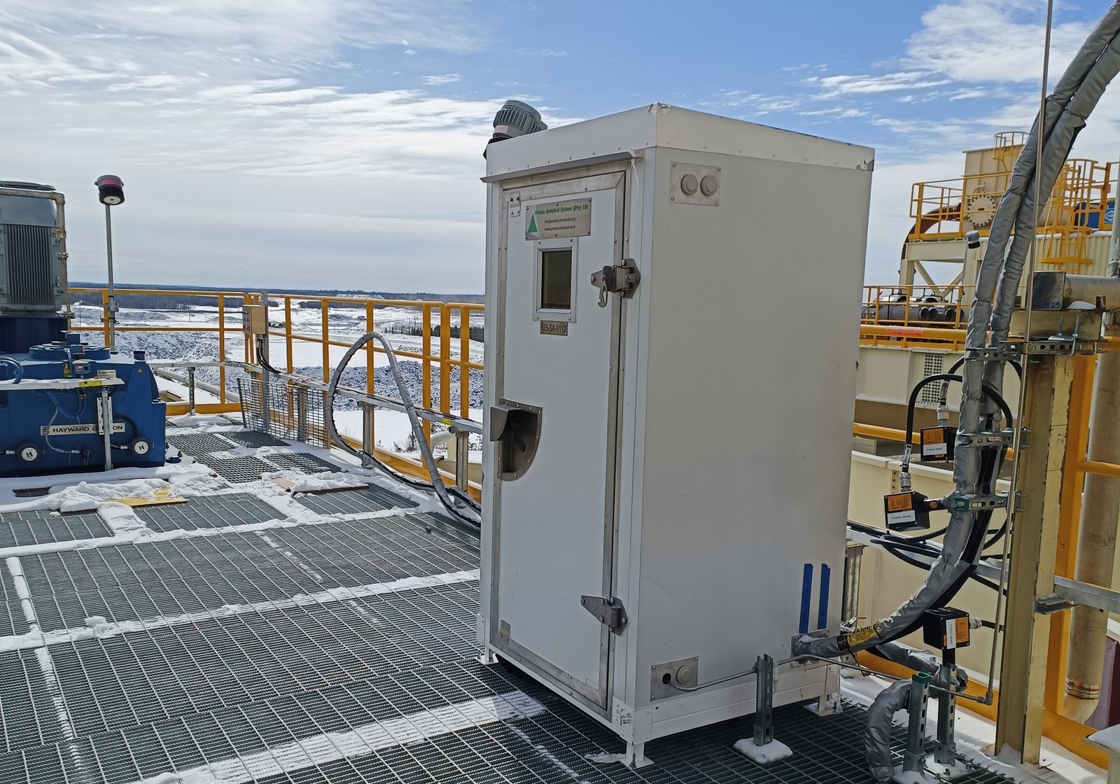 PAS analyser control booth installed on plant grating against open sky
